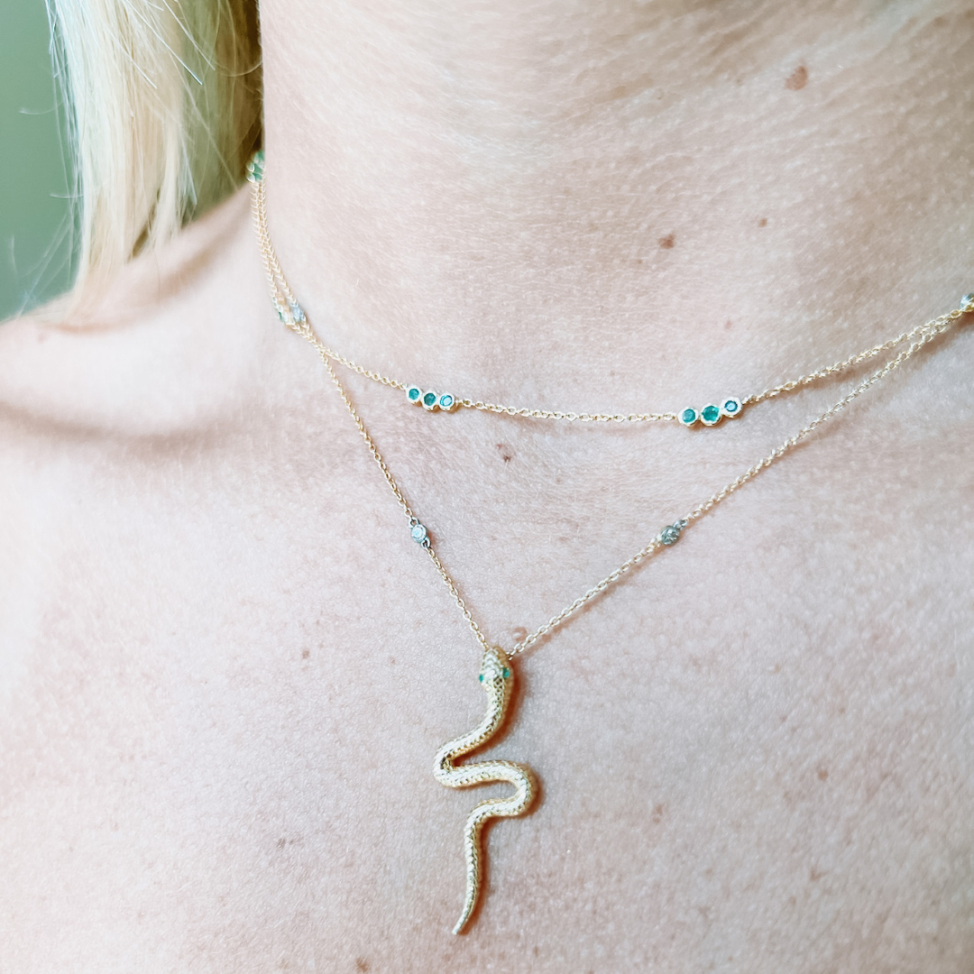 Gold snake sales pendant necklace